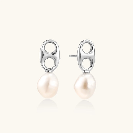 Modern rhodium-plated silver earrings with geometric double-circle design and freshwater pearl drops