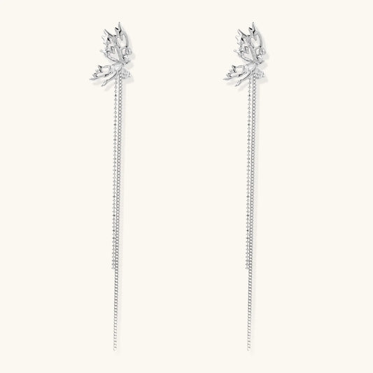 Silver-toned threader earrings featuring detailed fairy figure with wings and dual delicate chain strands, zirconia accents