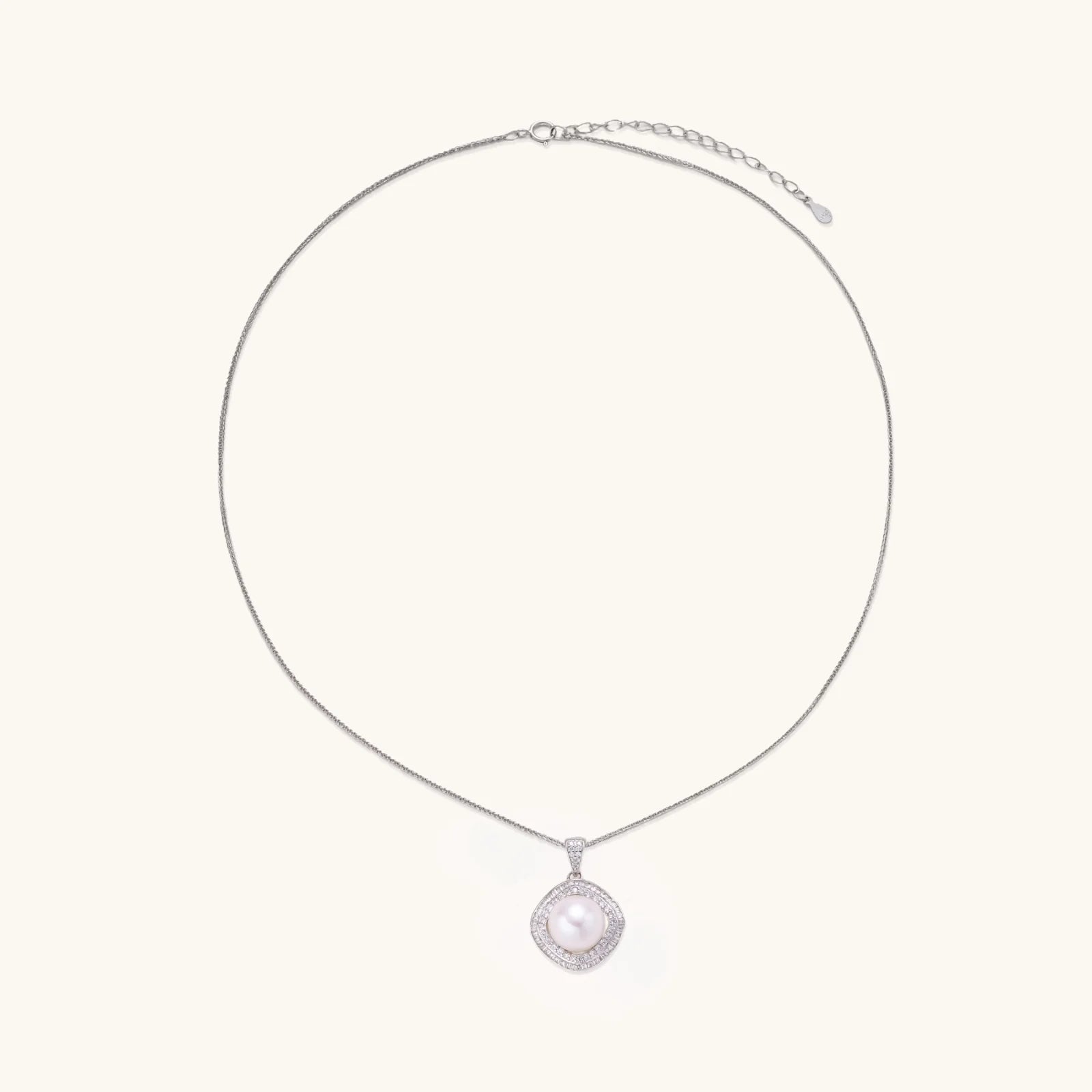 Cushion-shaped double halo pendant with 10mm freshwater pearl center on rhodium-plated sterling silver chain