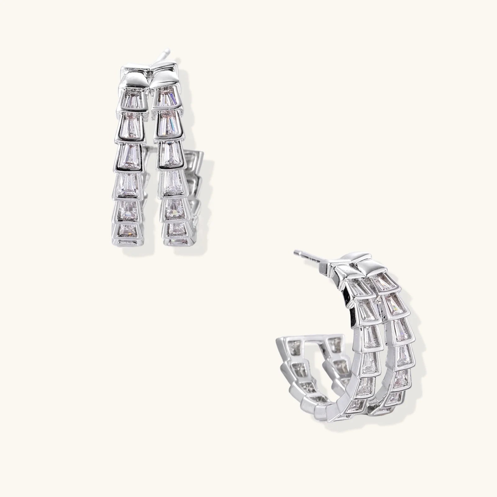 White gold-plated hoop earrings with double row of baguette-cut zirconia stones in geometric ladder design