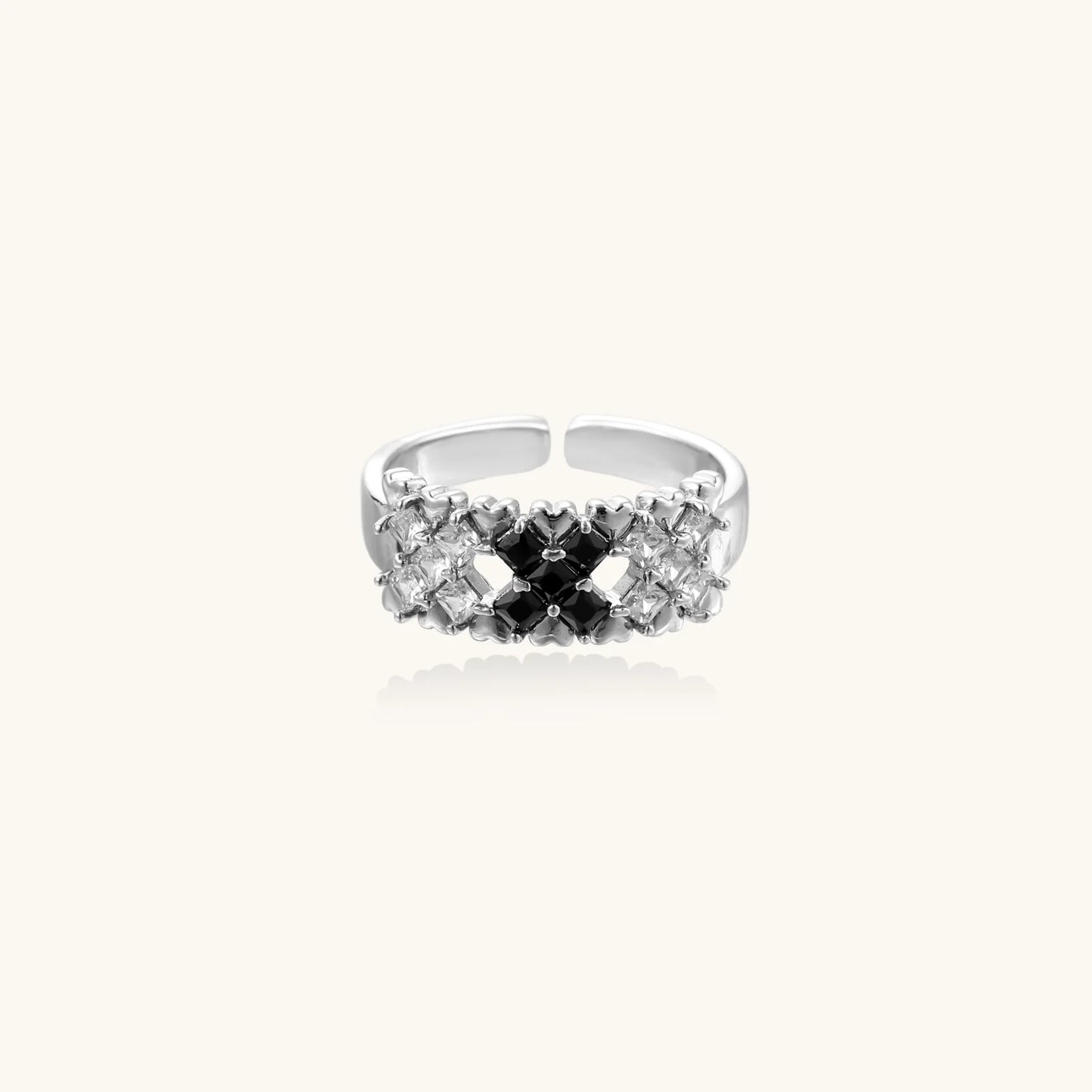 White gold plated adjustable ring with three rows of square zirconia stones in black or pink chevron pattern