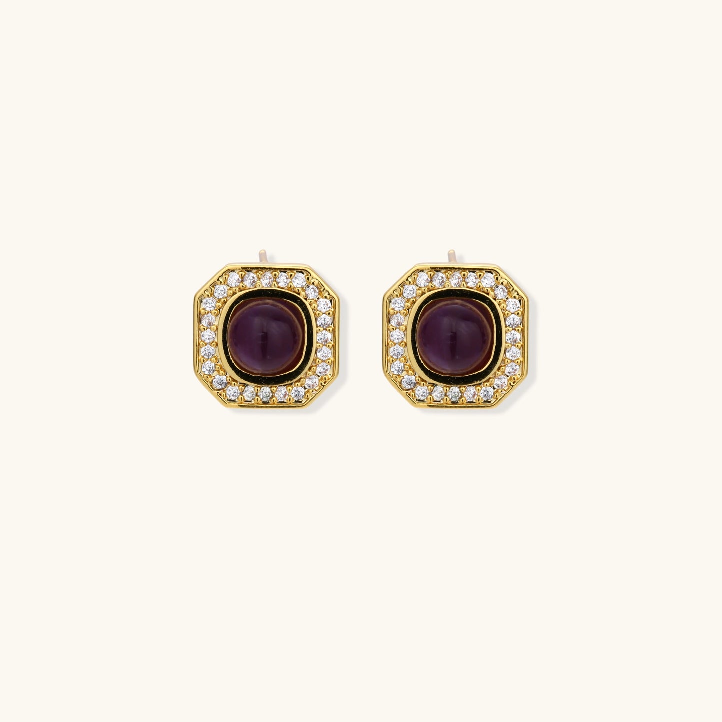 Gold-plated octagonal stud earrings with burgundy liuli centers and cubic zirconia halos on white background